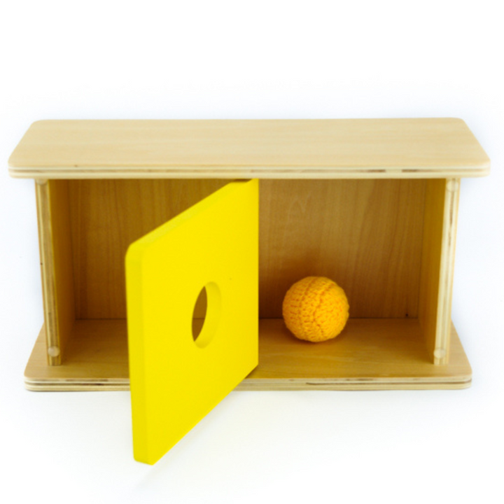 Boîte avec couvercle basculant et balle en tricot