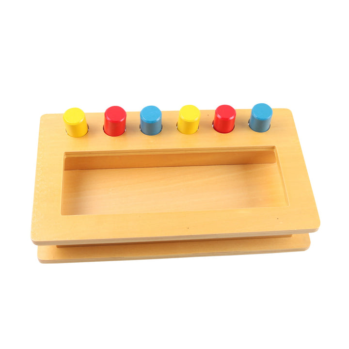Cylindres d'encastrement colorés - Boite de chevilles à encastrer - Eveil Montessori Maroc