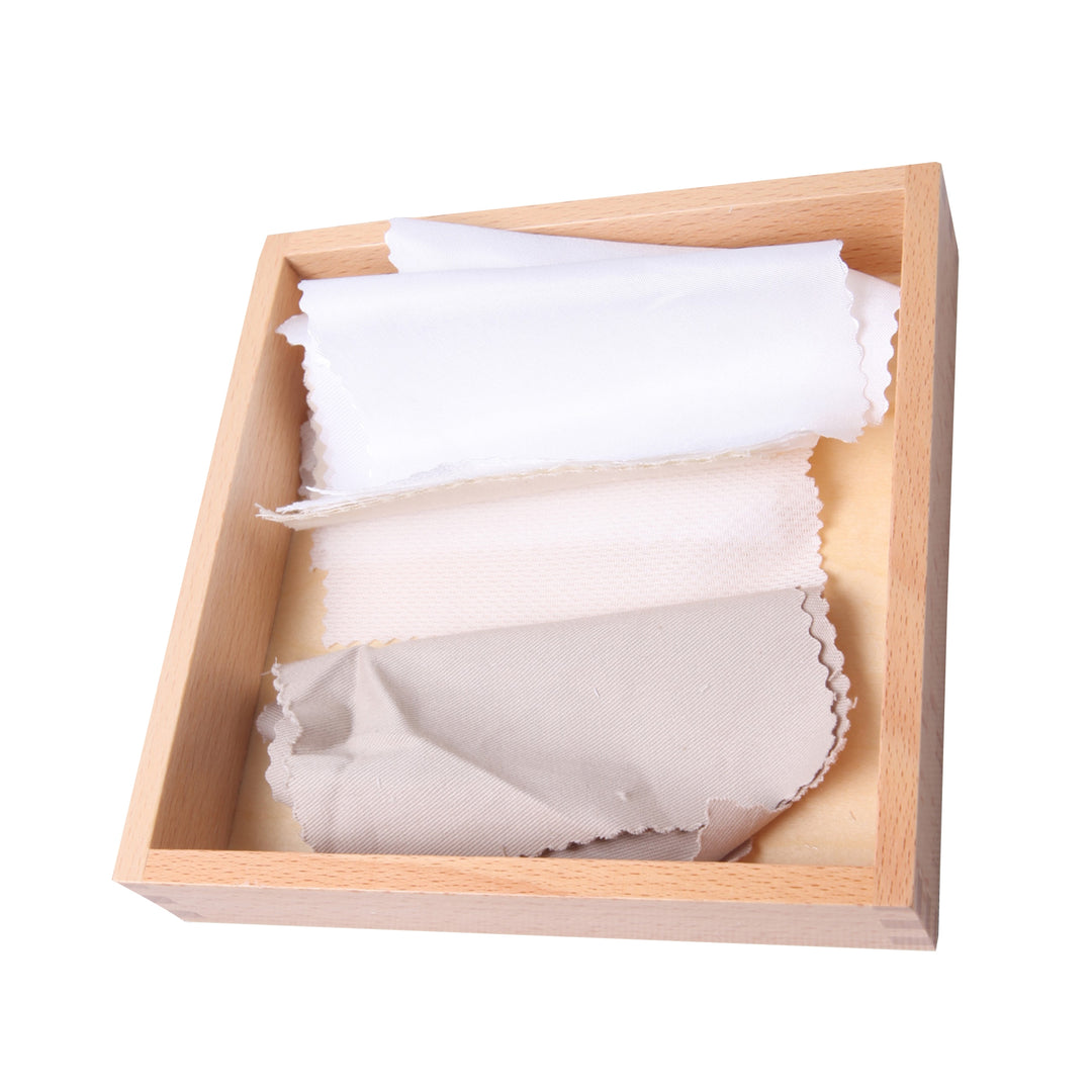 Boîte des tissus blancs - Eveil Montessori Maroc