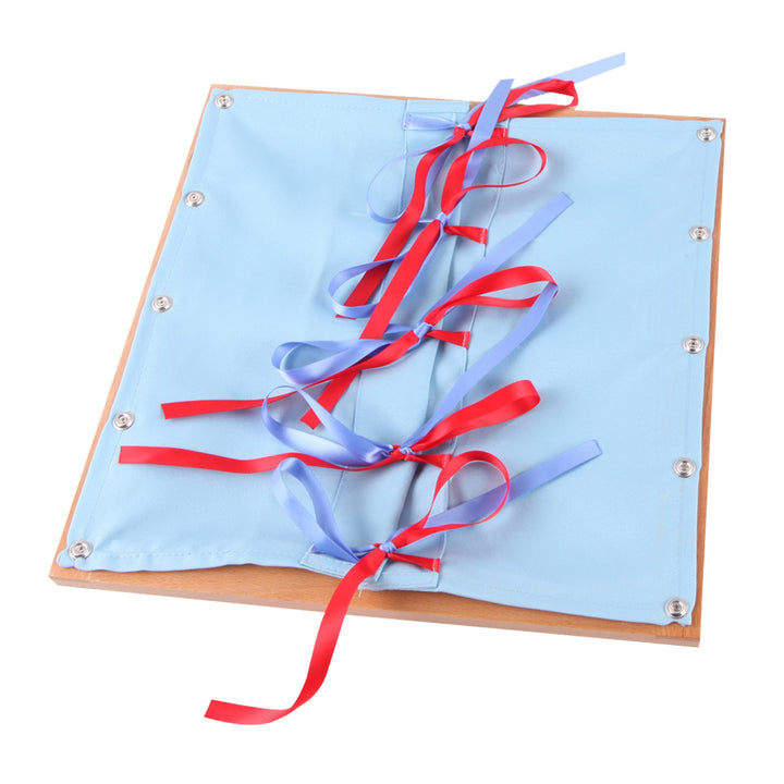 Cadre d'habillage à Rubans - Eveil Montessori Maroc