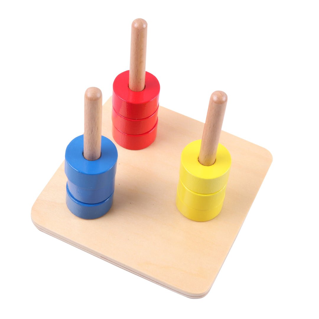 Disques sur trois tiges verticales - Eveil Montessori Maroc