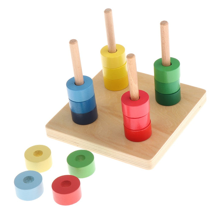 Disques sur quatre tiges verticales - Eveil Montessori Maroc